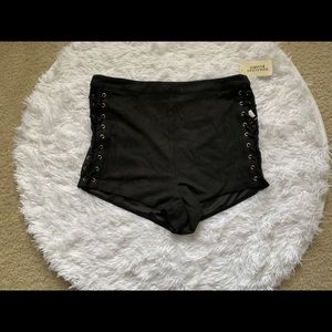 Black shorts with a lace up detail on the sides